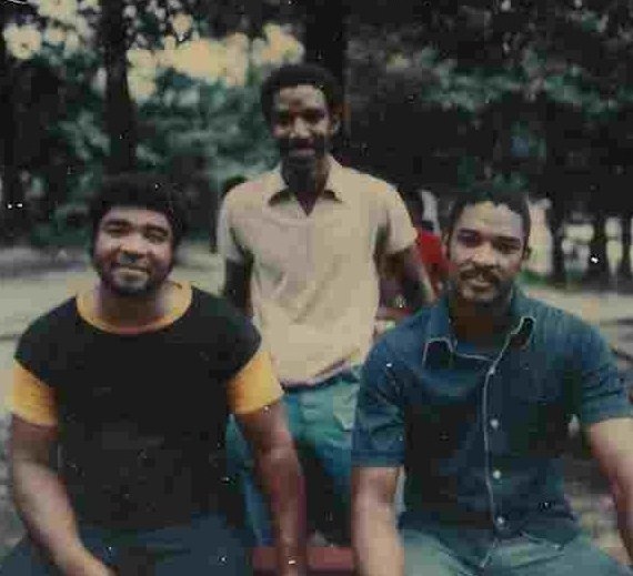 Tommy Robinson (on left) with brothers Zack, and George